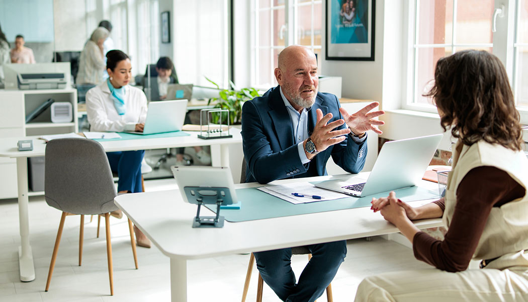 Man and woman at a community bank desk